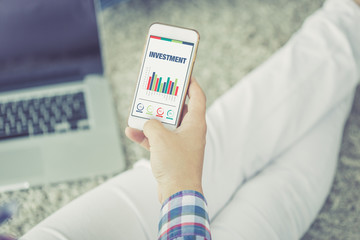 Business Charts and Graphs on screen with INVESTMENT title