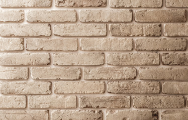 Beige brick wall