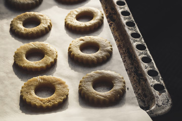 raw pastry (dough) round shape (ring) on ​​a baking sheet for baking