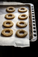 raw pastry (dough) round shape (ring) on ​​a baking sheet for baking