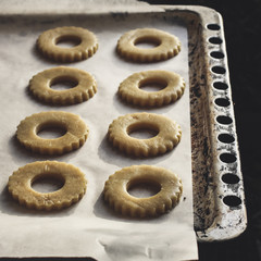 raw pastry (dough) round shape (ring) on ​​a baking sheet for baking