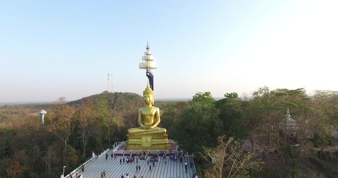 Aerial scene of big Buddha statue over top of mountain at Thailand