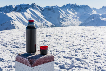 Boundary stone used as a table for a thermos of tea.