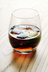 soda with ice cube and lime