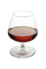 Glass with brandy and cognac on white background