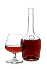 Glass with brandy and cognac on white background