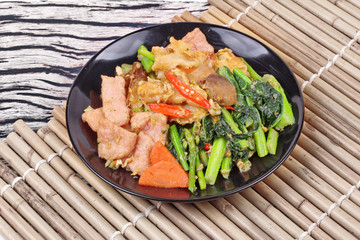 Fried big noodle topped mixed vegetables for organic food.