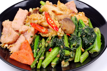 Fried big noodle topped mixed vegetables for organic food.