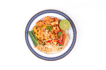 Popular Thai fried noodle call Pad Tai on Thai-pattern dish.