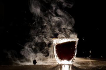 An illuminated coffee cup