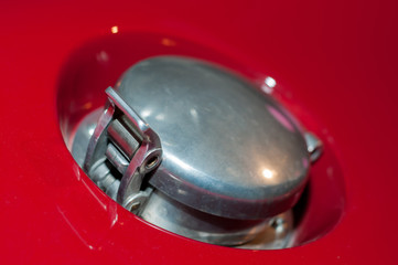 Classic race car fuel tank cap made from stainless steel.