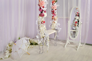 swing decorated with flowers