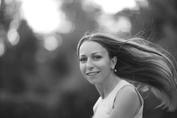 Obraz premium Monochrome portrait of a young woman wiyh long hair