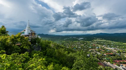 Fotobehang Pagoda on the mountain at wat phra phutthabat Phanam in Li,lamphun © bouybin
