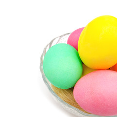 Colorful easter eggs isolated in bowl