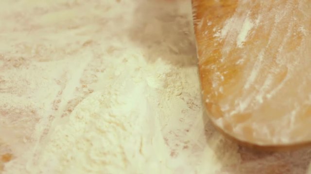 Woman working with dough. making homemade croissants