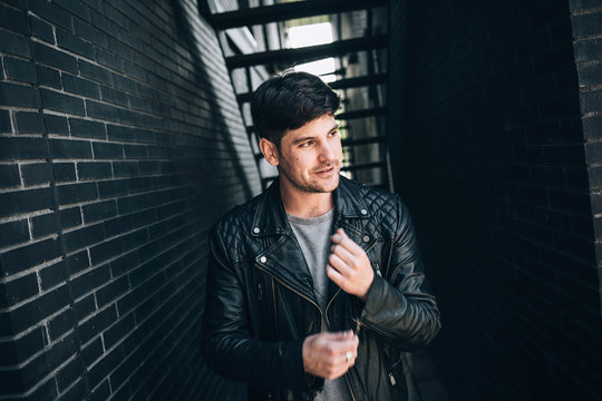 Confident man in leather jacket