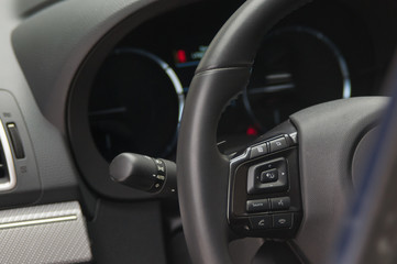 Fototapeta na wymiar Buttons on the steering wheel.