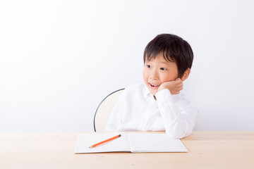 Naklejka premium ひらめいた少年