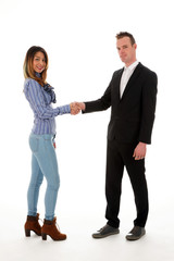 businessmen shaking hands standing in front of white