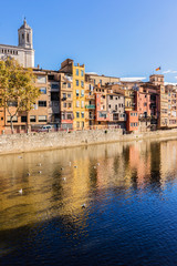 Colorful houses of Girona reflecting in Onyar River. Spain.