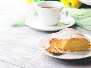 Bundt cake with sugar frosting. Spring breakfast set. Easter festive treat