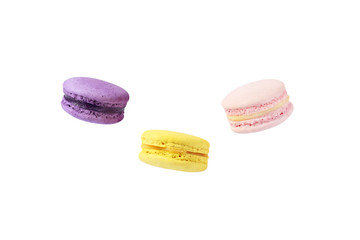 Three colorful macarons isolated