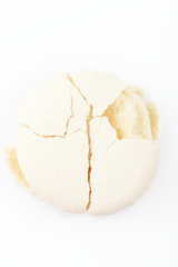 Smashed fresh macaron with soft cream inside, isolated