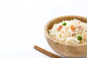 Fried chinese rice with vegetables isolated on white background
