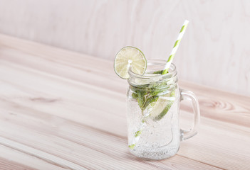 Detox Water, Refreshing summer detox cocktail, on wooden rustic table, copy space