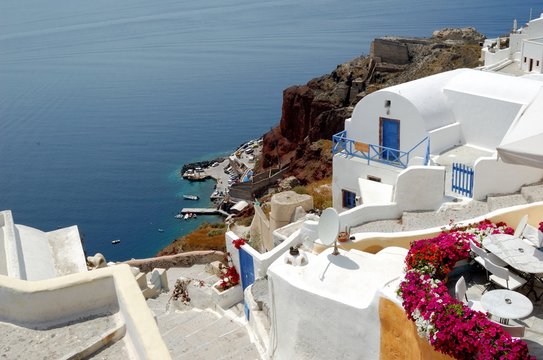 Santorini - the volcano among the Cyclades, Aegean sea. Island's capital, Fira, which is situated on the edge of a cliff. Known for distinctive architecture in white and blue colours