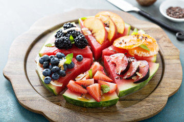 Watermelon pizza with various fruts