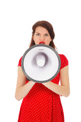 angry young brunette woman shouts loud in megaphone