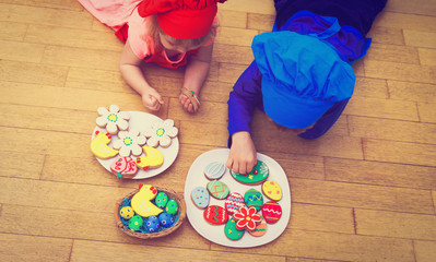 little boy and girl making easter cookies