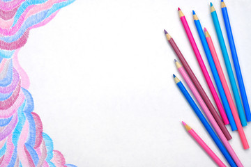  Pink and blue color pencils on white background with abstract picture 