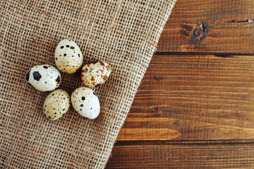 Useful quail eggs. Top view. The concept of healthy eating and vegetarianism.
