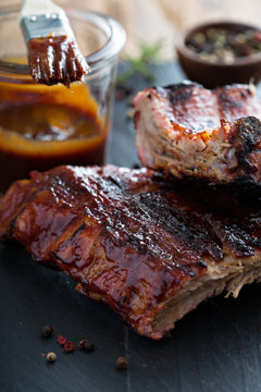 Grilled pork baby ribs with bbq sauce