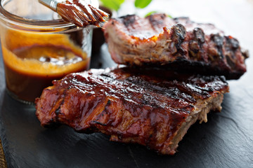 Grilled pork baby ribs with bbq sauce