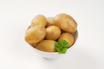 raw unpeeled potatoes
