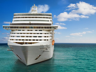 Naklejka premium Luxury Cruise Ship Sailing to Port