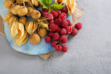 Tropical fruit plate with mango and peaches