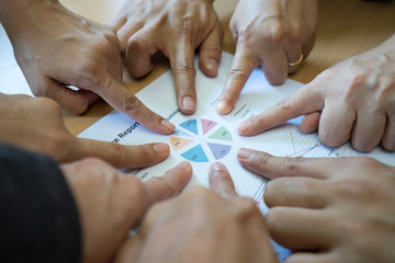 Teamwork Join finger Support Together Concept on finance report