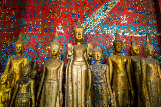 Buddha statues in Wat Xieng Thong in Luang Prabang