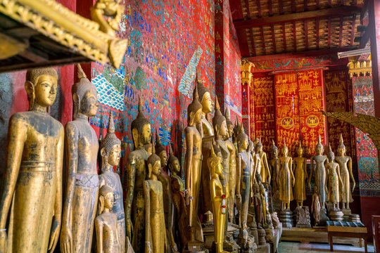 Buddha statues in Wat Xieng Thong in Luang Prabang