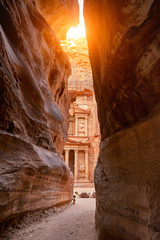 The temple-mausoleum of Al Khazneh in the ancient city of Petra in Jordan - obrazy, fototapety, plakaty