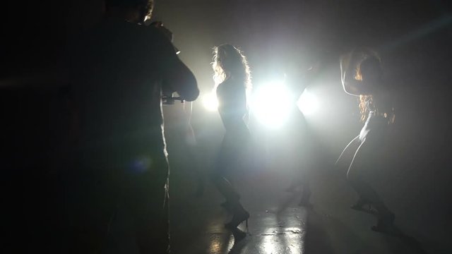 Videographer take video dancing girls