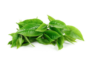 pile of green tea leaves isolated on white background
