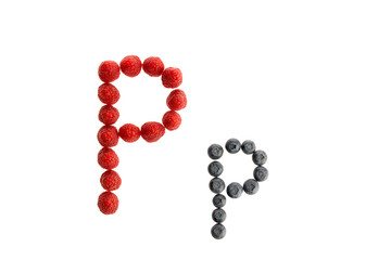 Alphabet from fresh fruit, raspberry and blackberry