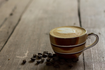 Coffee cup on the table, latte art