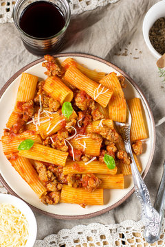 Pasta rigatoni in bolognese sauce with ground meat
